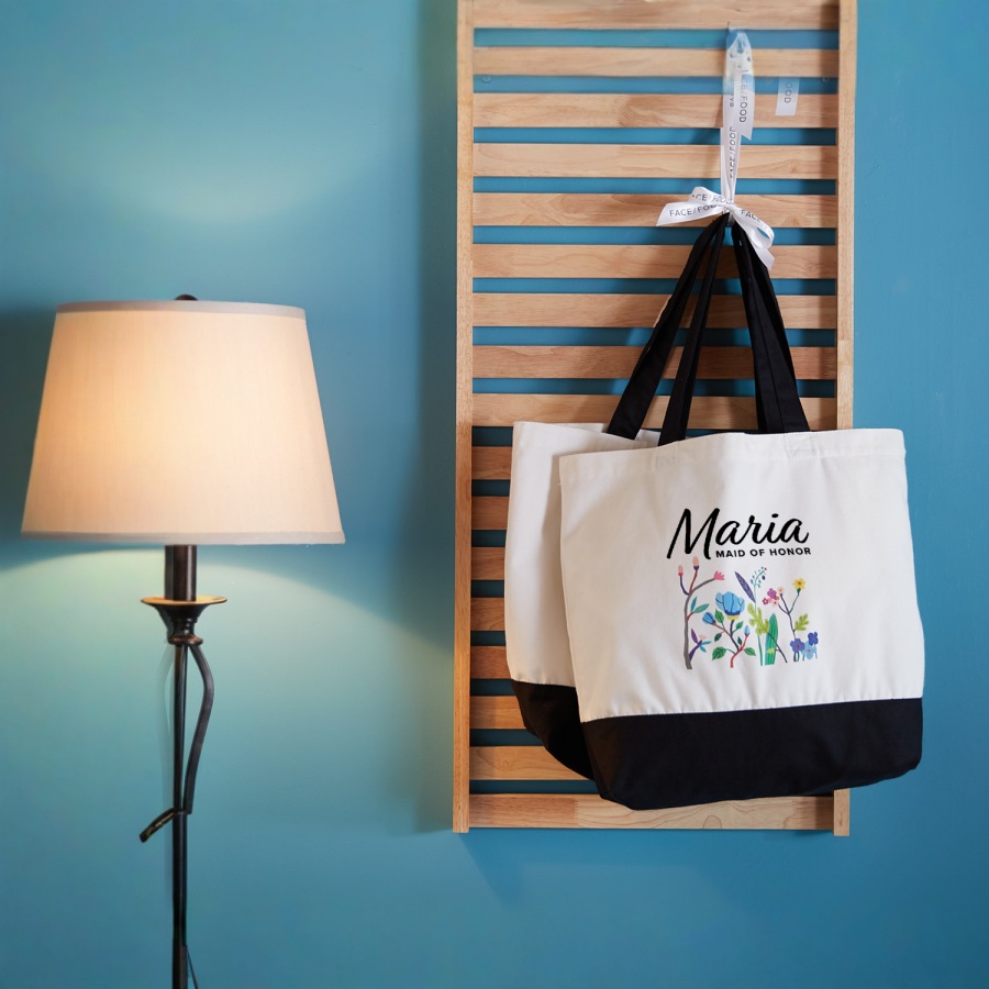 A couple of custom canvas totes personalized for a wedding party. 