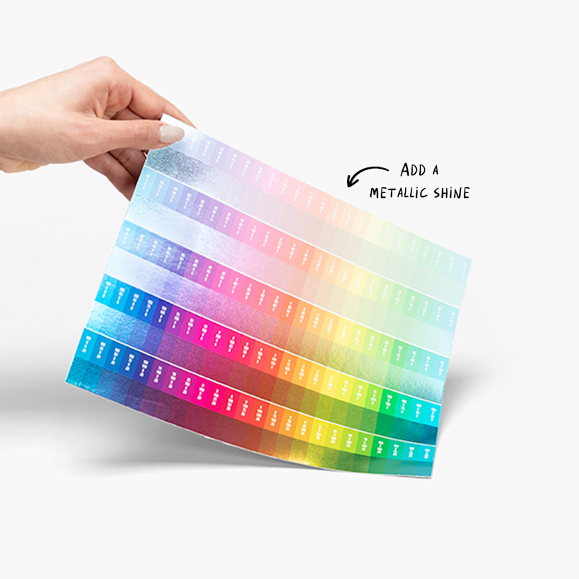 A person holding a color chart showing all the possible foil options, with a note pointing out that they add a metallic shine.