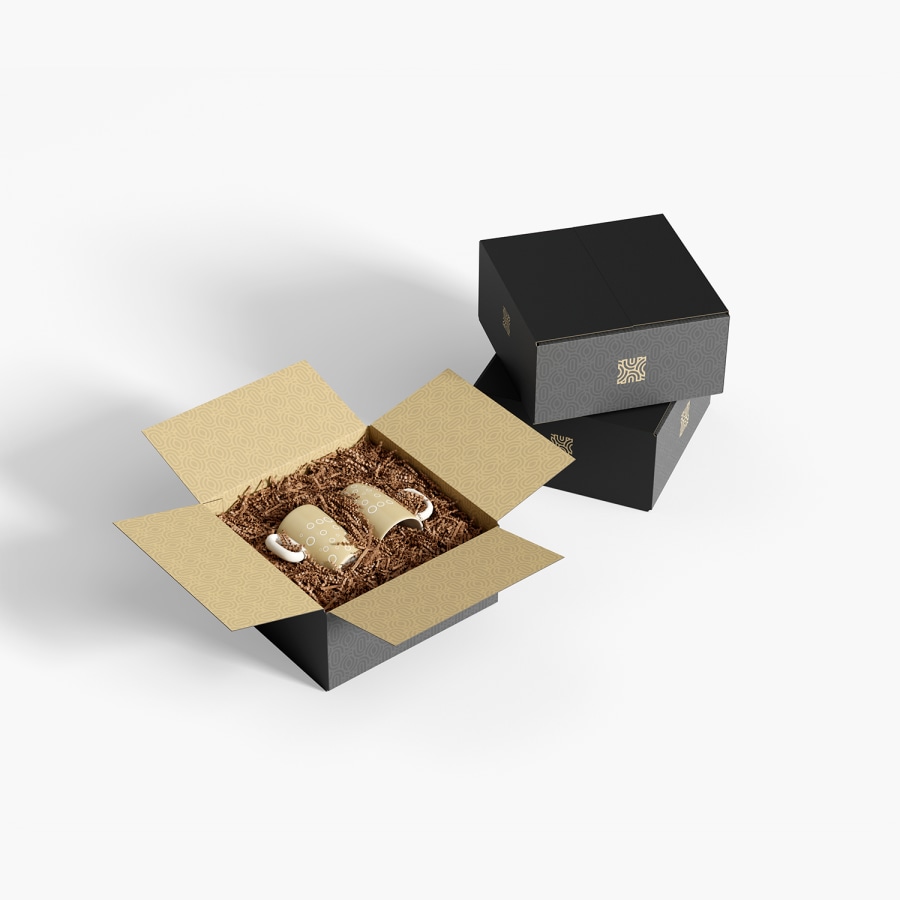 Two boxes filled with crinkle paper