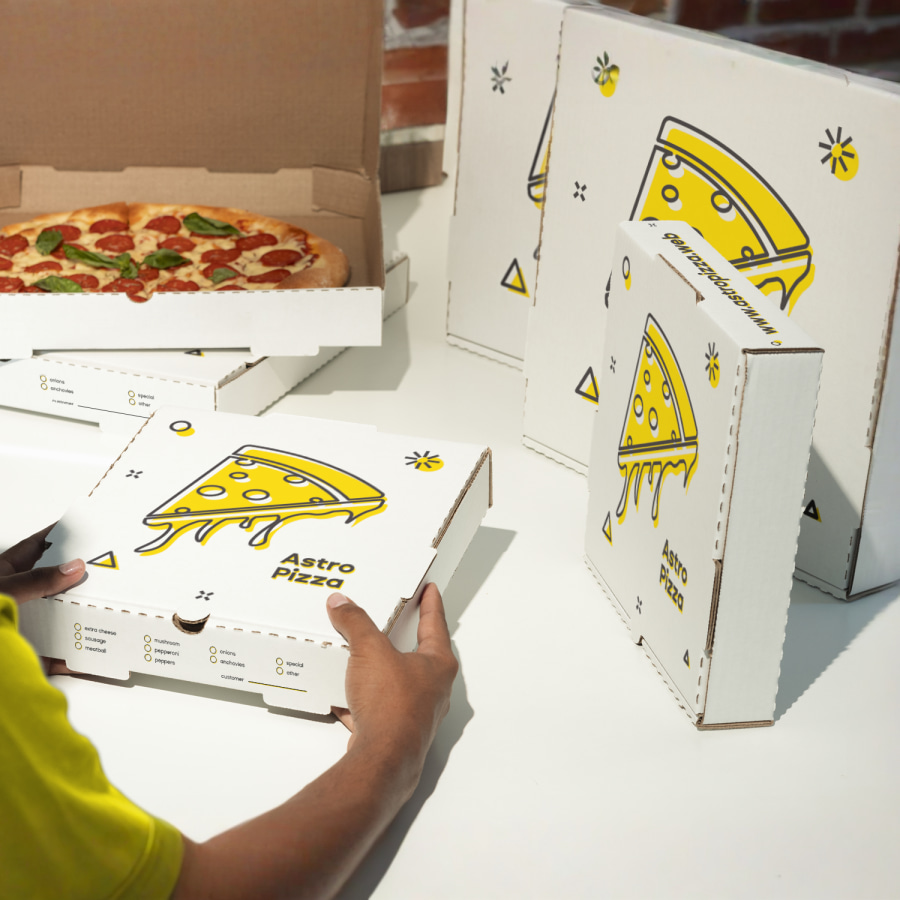 Branded pizza boxes of different sizes.