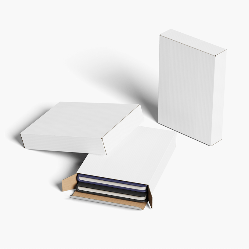  3 plain flat shipping boxes – 1 is filled with books.