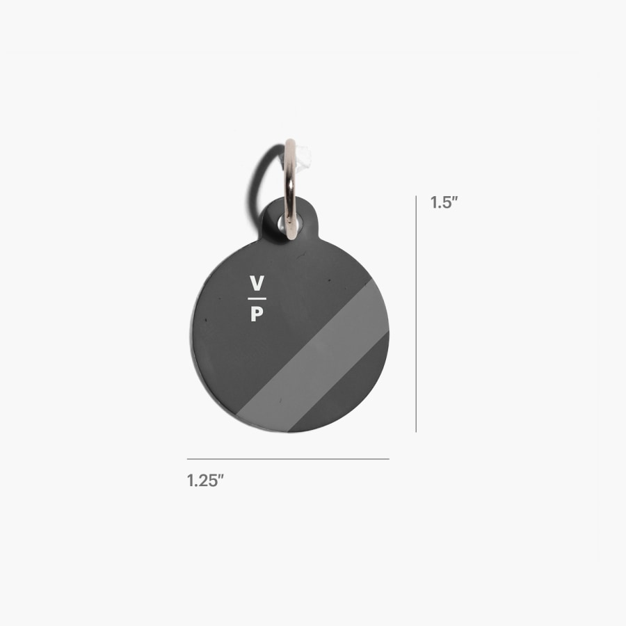 A custom pet tag labeled by its size: 1.25" inches long and 1.5" tall. 