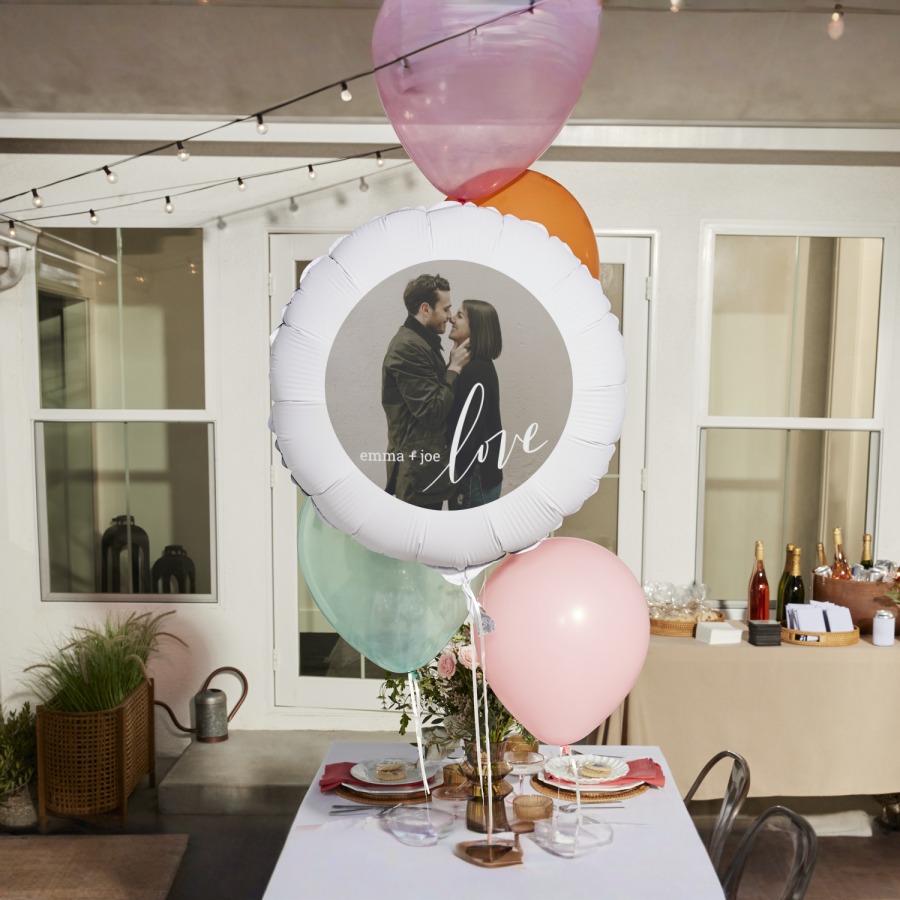 A photo balloon personalized for a bridal shower, printed with a photo of the bride and groom.