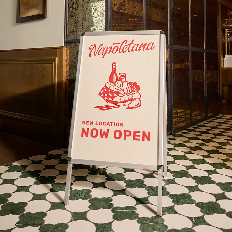 An aluminum A-Frame featuring an Italian restaurant.