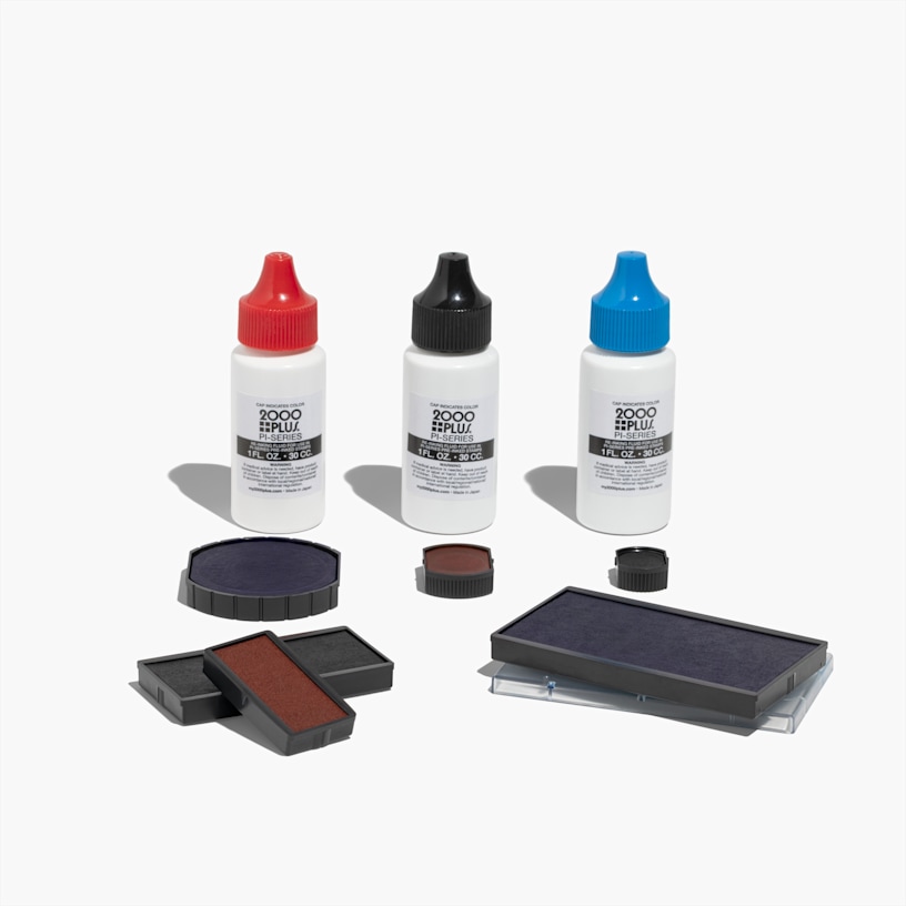 A small black, medium blue and large red rectangular replacement ink pad.
