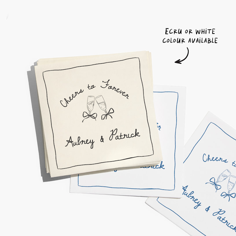 A stack of white and ecru cocktail napkins customized for a wedding, with a note that ecru and white colors are available. 