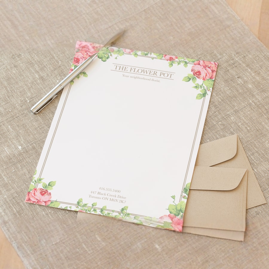 Letterheaded papers from an attorney with the company name at the top and contact details at the bottom, stacked on a desk.