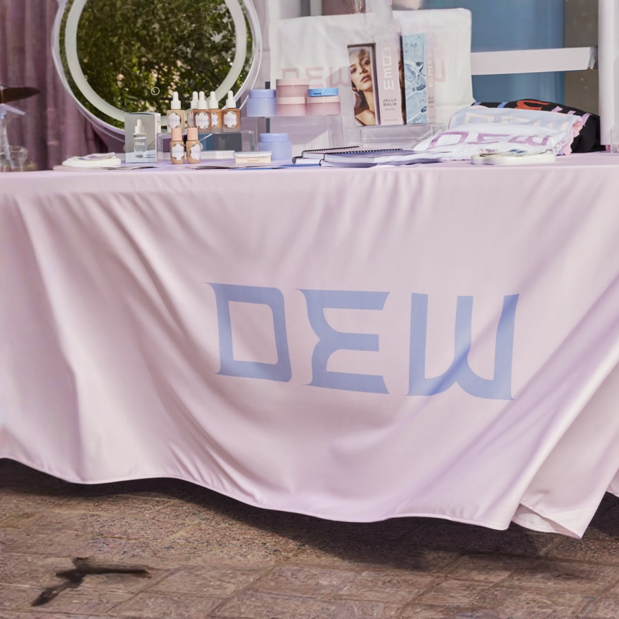 custom rectangle tablecloth for a beauty brand at an event 
