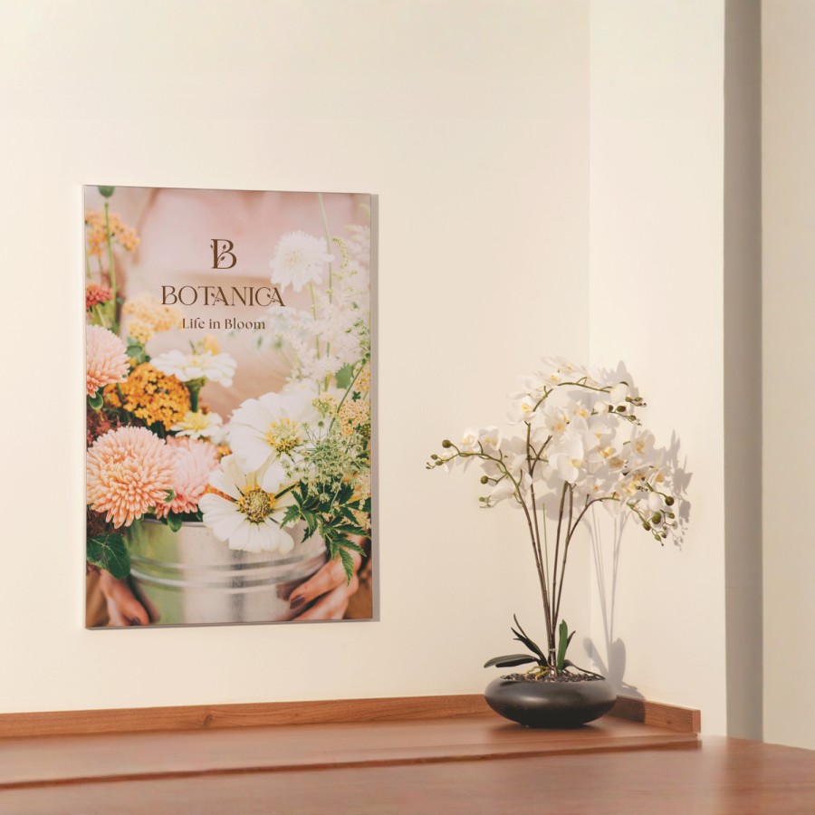 A fabric frame from a flower shop, with a note pointing out the vivid, fade-resistant printing.