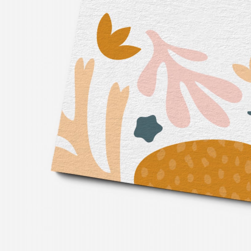 A close-up of a bamboo business card, highlighting its natural woven texture.