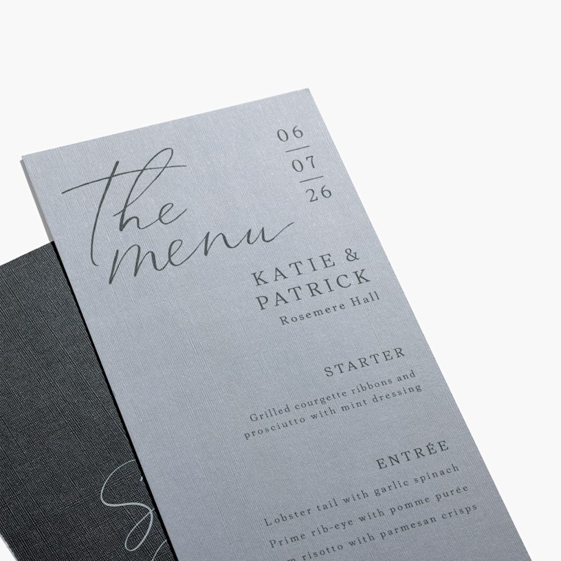 A grey-coloured wedding menu customised with various food offerings for a reception. 