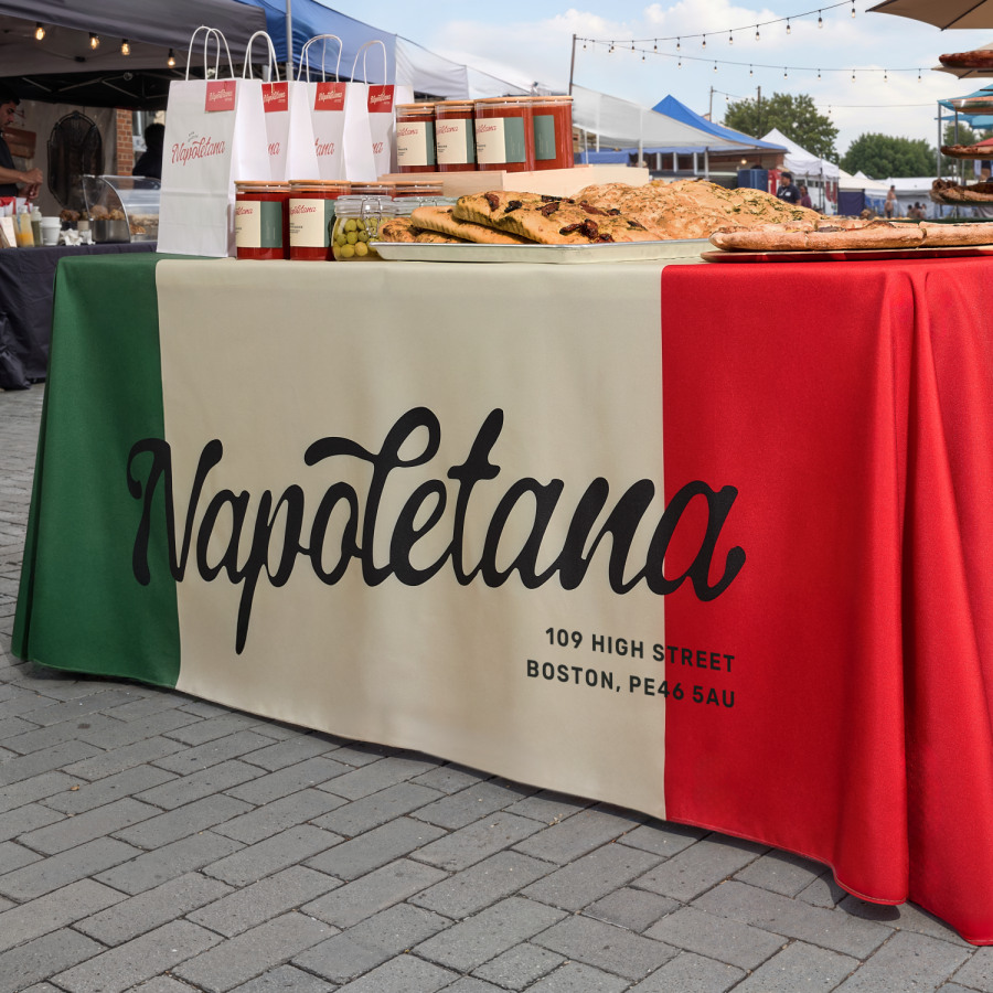 edge of a rectangle tablecloth with company logo 