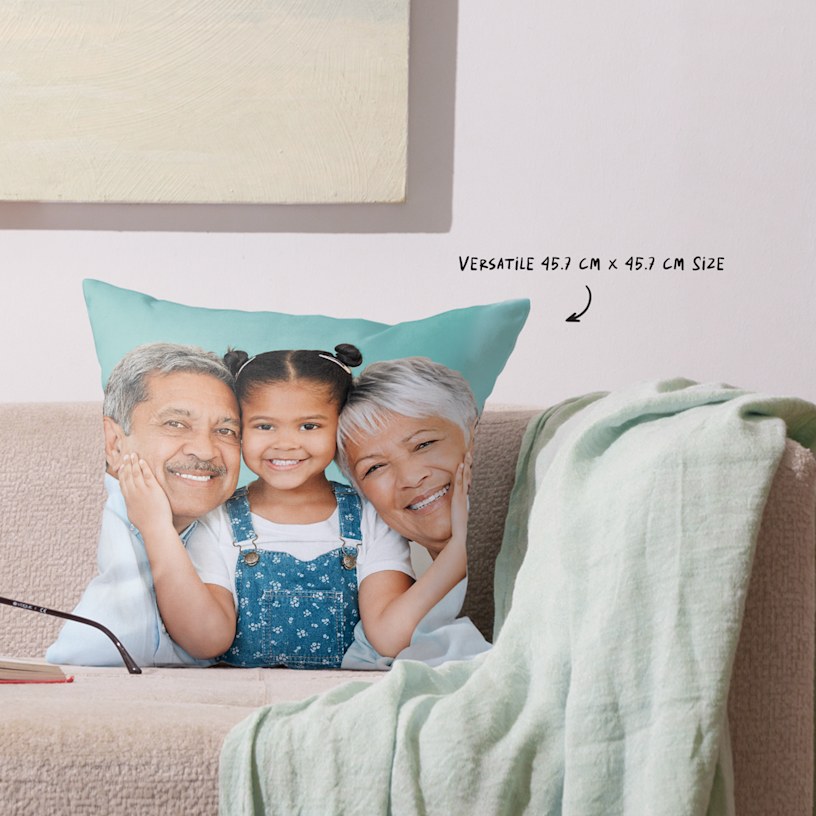 Custom photo pillow with a smiling child and grandparents printed in a versatile 45.7 x 45.7 cm cushion size on a soft personalised pillow