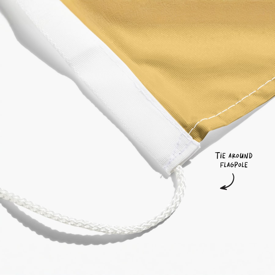 A close-up of a flag’s bottom string, with a note saying to tie the string around the flagpole.