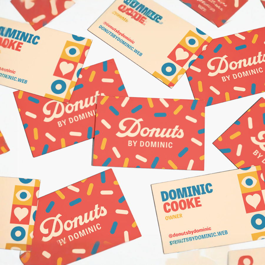 Designs for the front and back of several triple layer business cards for a doughnut shop.