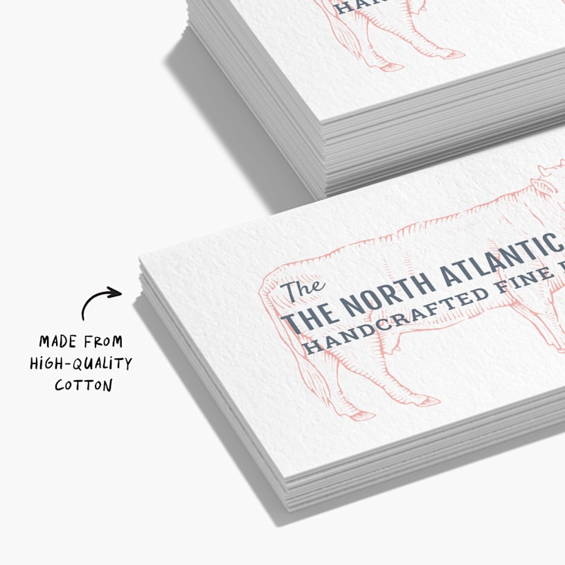 Business cards for a fine-dining restaurant with a note that they’re made from high-quality cotton.