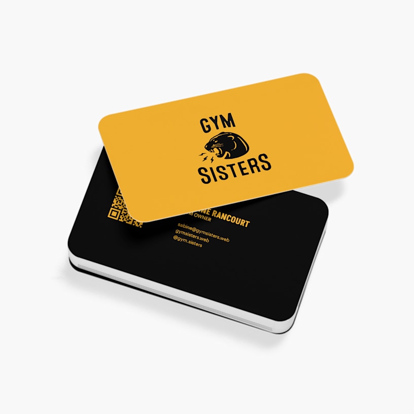 The front and back of a rounded corner QR code business card for a coffee shop.