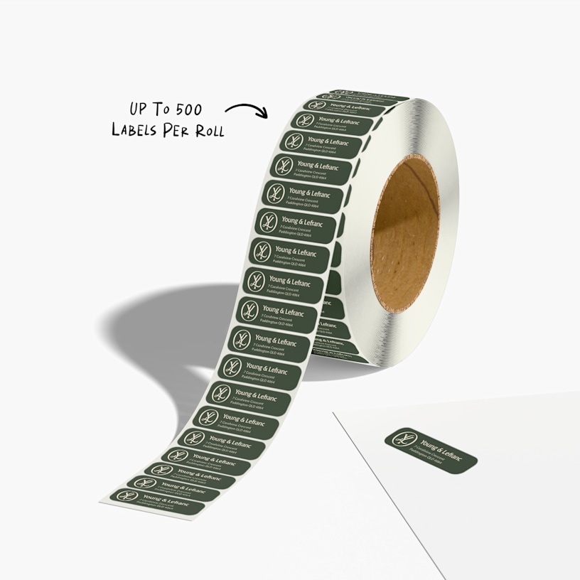 A return address label roll promoting a consultancy business. An arrow points to the total label count, which is up to 500 labels per roll.