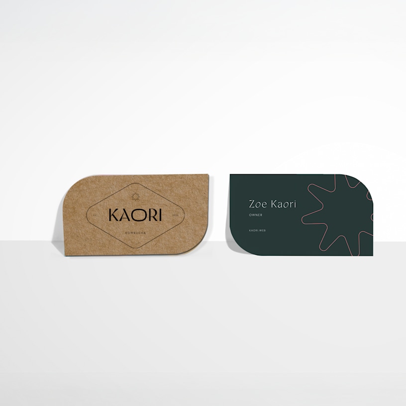 Kraft leaf shaped name cards promoting a kombucha business, with 2-sided printing.