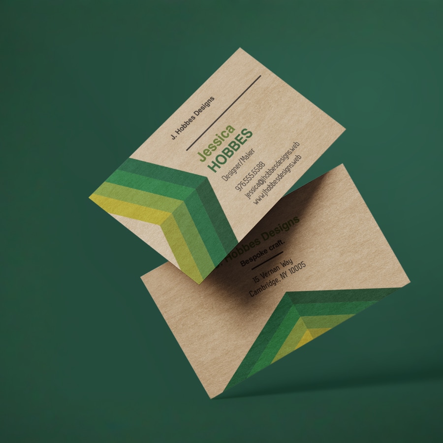 The front and back sides of a kraft business card from a bespoke designer.