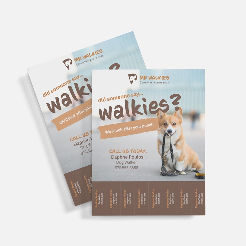 A perforated flyer for a dog walker has customized text, photos and logos.