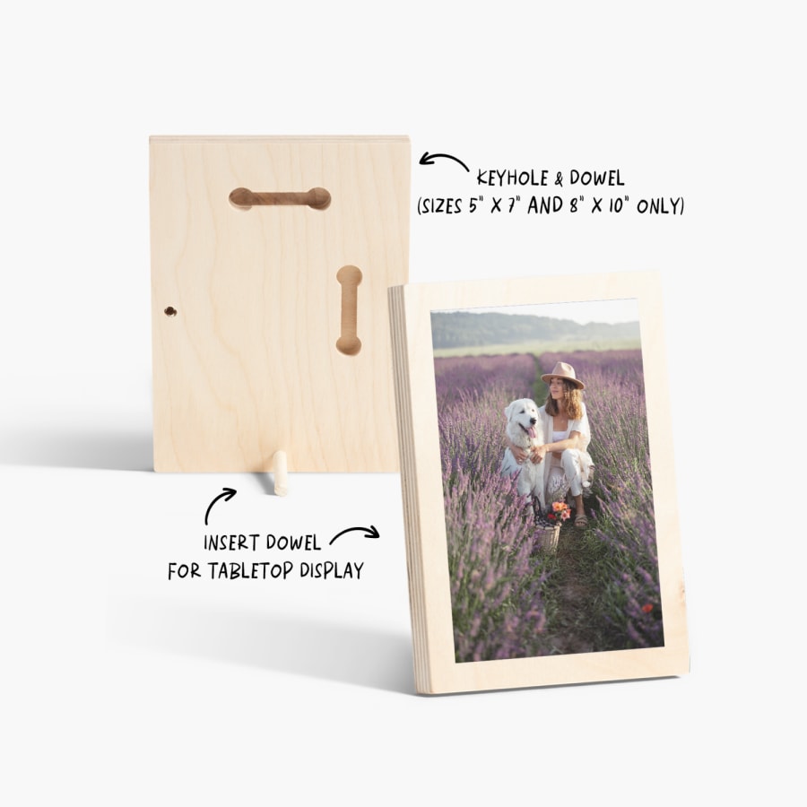 The font and back of a custom wood print featuring a photo of a woman and her dog in a lavender field. A note indicates that sizes sizes 5" x 7" and 8" x 10" come with a keyhole and dowel for tabletop display. 