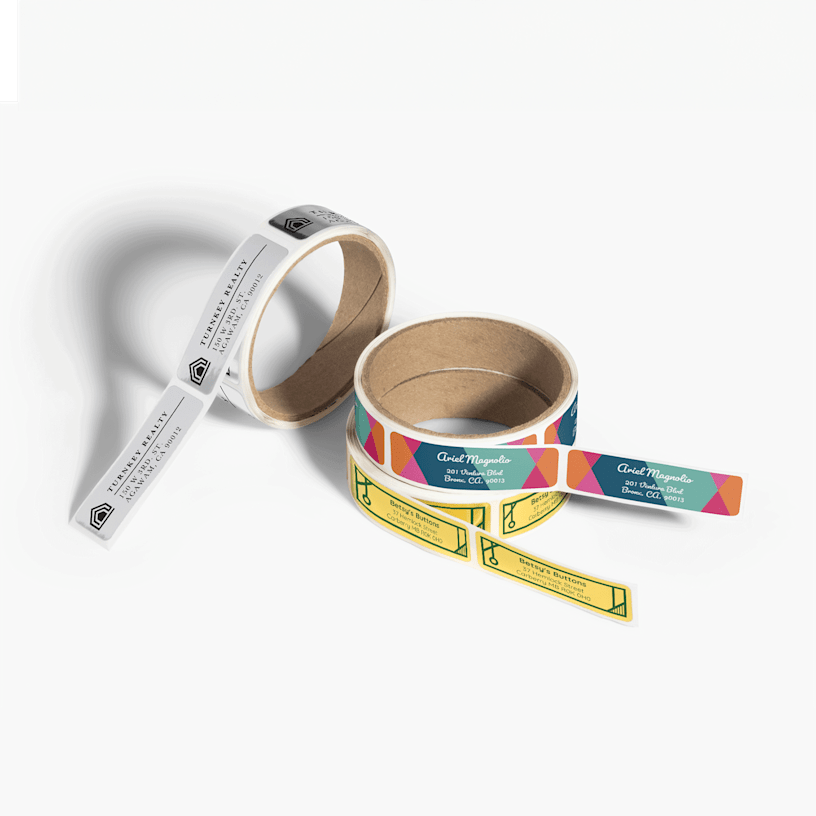 3 rolls of return address labels from different companies.