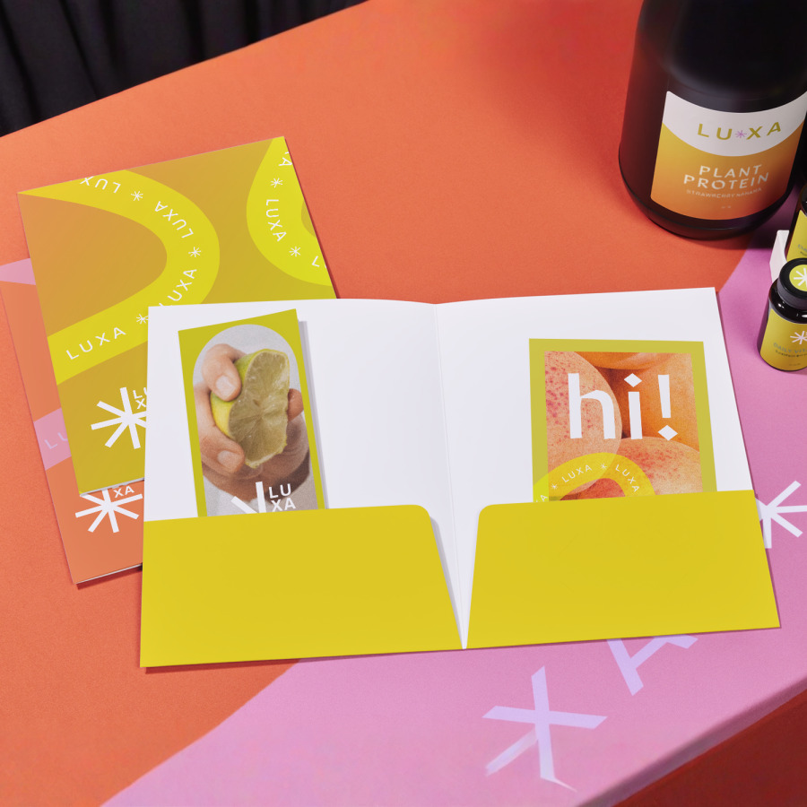 Presentation folders for a food company, showing both a custom inside and outside.