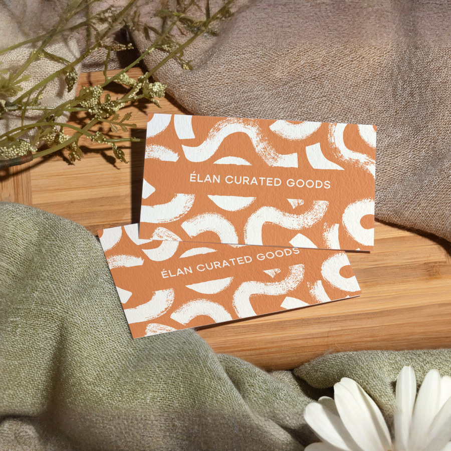 Cotton business cards for a curated goods business.