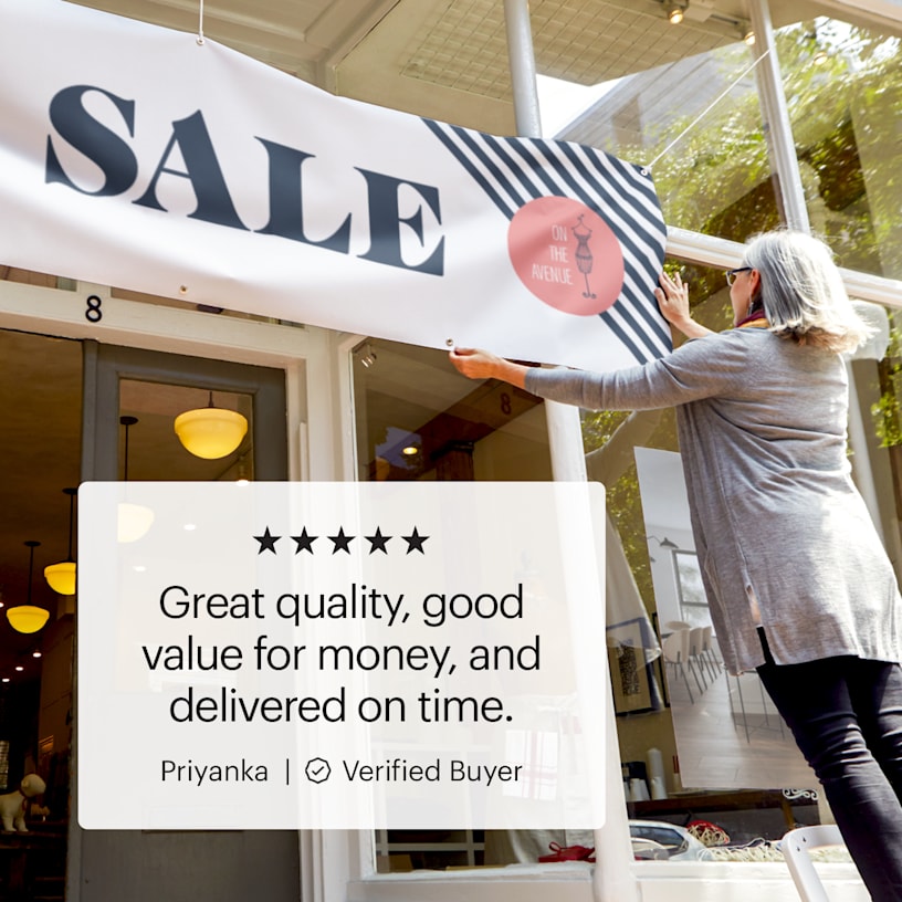 A business owner hanging a vinyl banner promoting a sale, and a customer review: “Great quality, good value for money, and delivered on time”