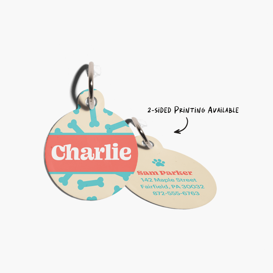 The front and back view of a pet tag, customized with a pet name and the owner’s contact details.
