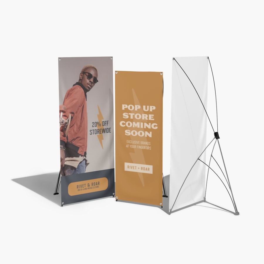 2 different sized X-banners promoting a clothing boutique and a pop-up store.
