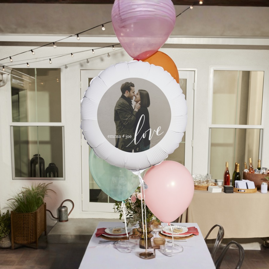 A photo balloon personalized for a bridal shower, printed with a photo of the bride and groom.