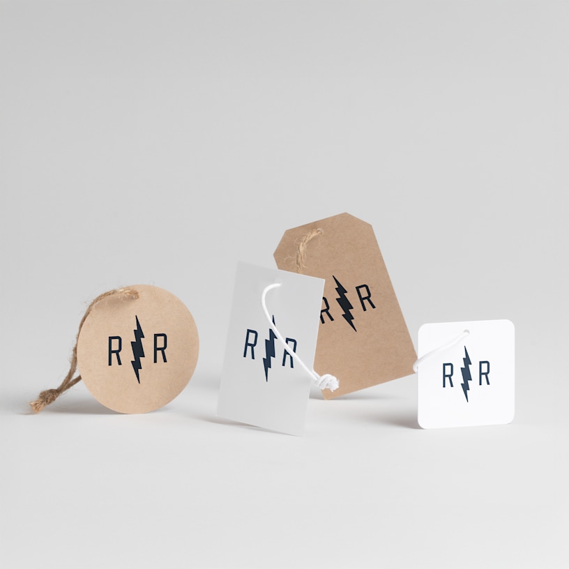  A variety of hang tag shapes with string tags attached.