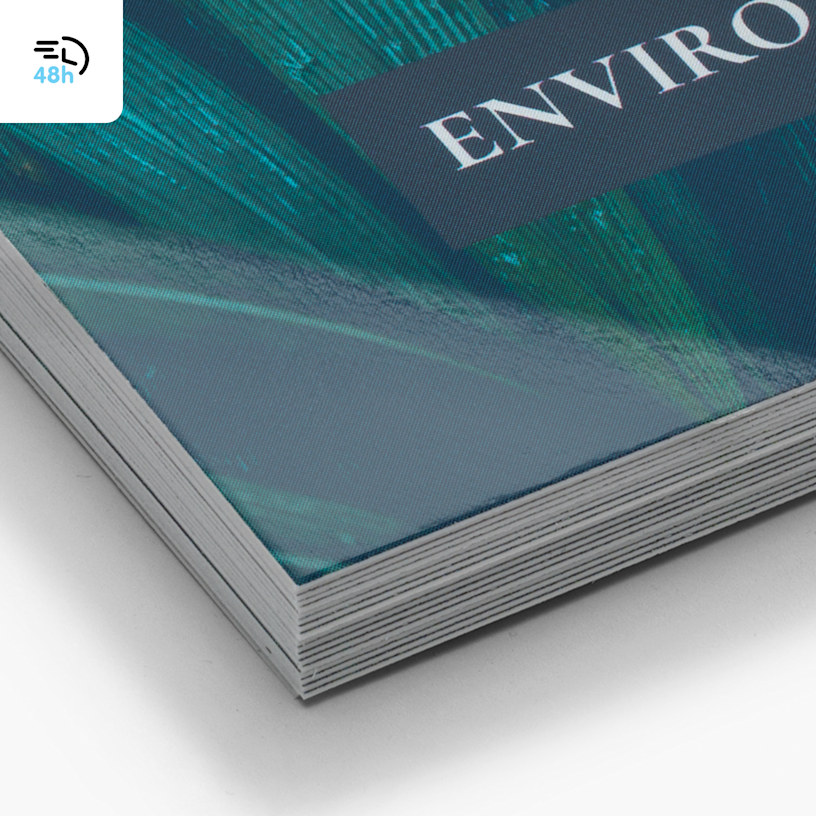 A close-up of a stack of teal and blue glossy business cards, with a 48-hour delivery icon in the corner.