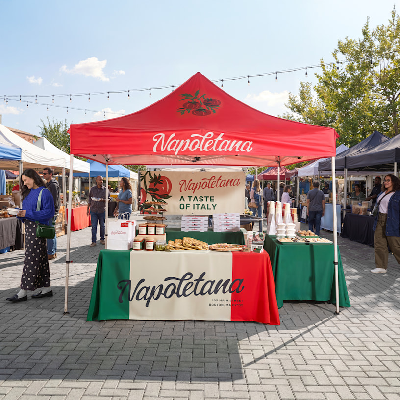  A custom canopy tent shown outdoors promoting an Italian food company.