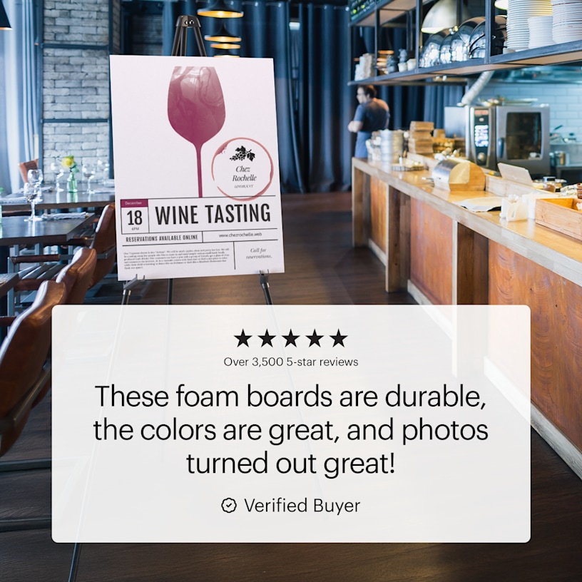 A foam board on an easel for a wine tasting event. A customer testimonial reads: “These foam boards are durable, the colors are great, and photos turned out great!”