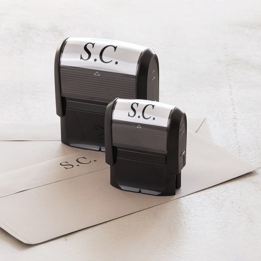 A small and a large rectangular stamp featuring the same design.