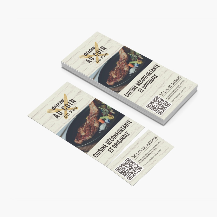 Deux coupons détachables créés pour un restaurant, avec des bons de réduction détachables d’un montant de 20 $. 