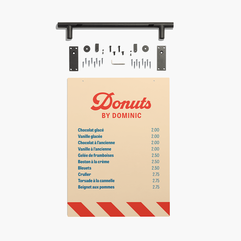  Un tableau de menu affichant le menu d’une boutique de beignes avec les prix. Les pièces d’assemblage incluses sont présentées au-dessus du tableau de menu.