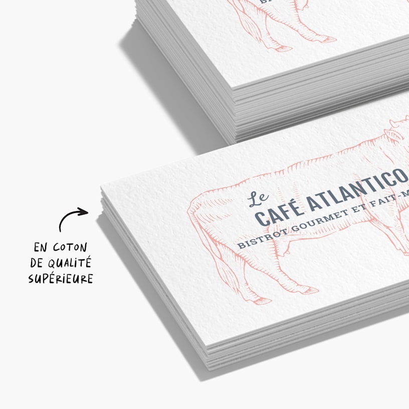 Cartes de visite pour un restaurant gastronomique avec une note précisant qu’elles sont faites en coton de haute qualité.
