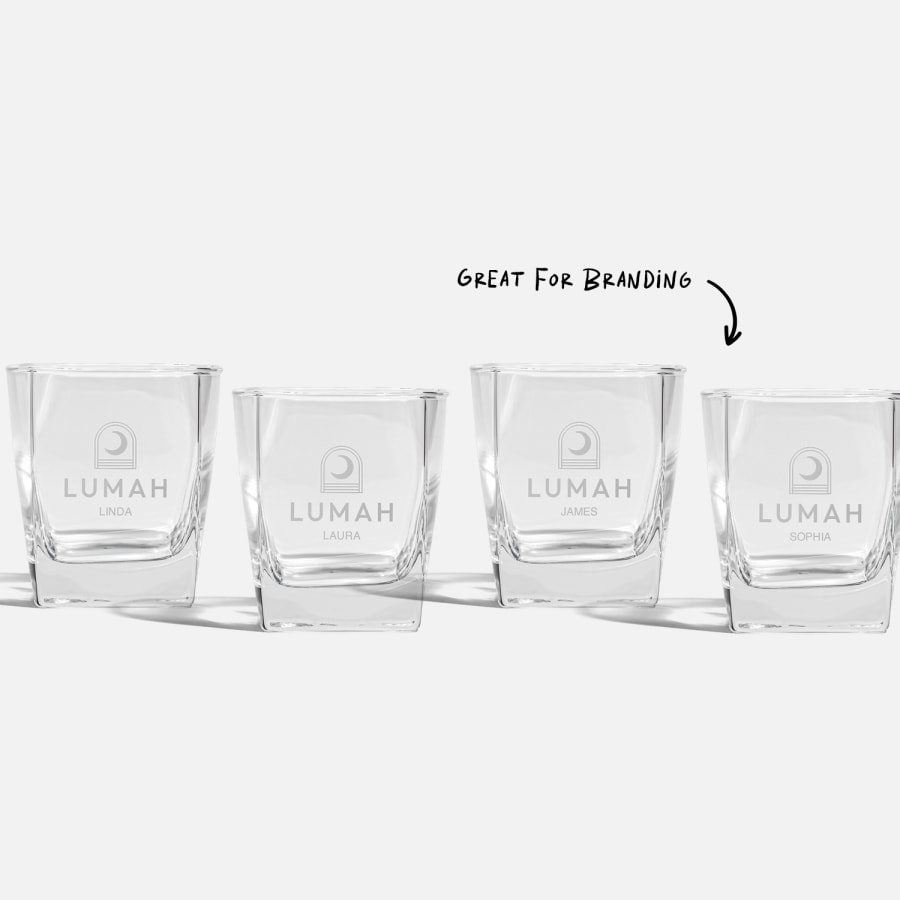 A set of 4 tumblers with a business logo and personalised with the individual names of team members.