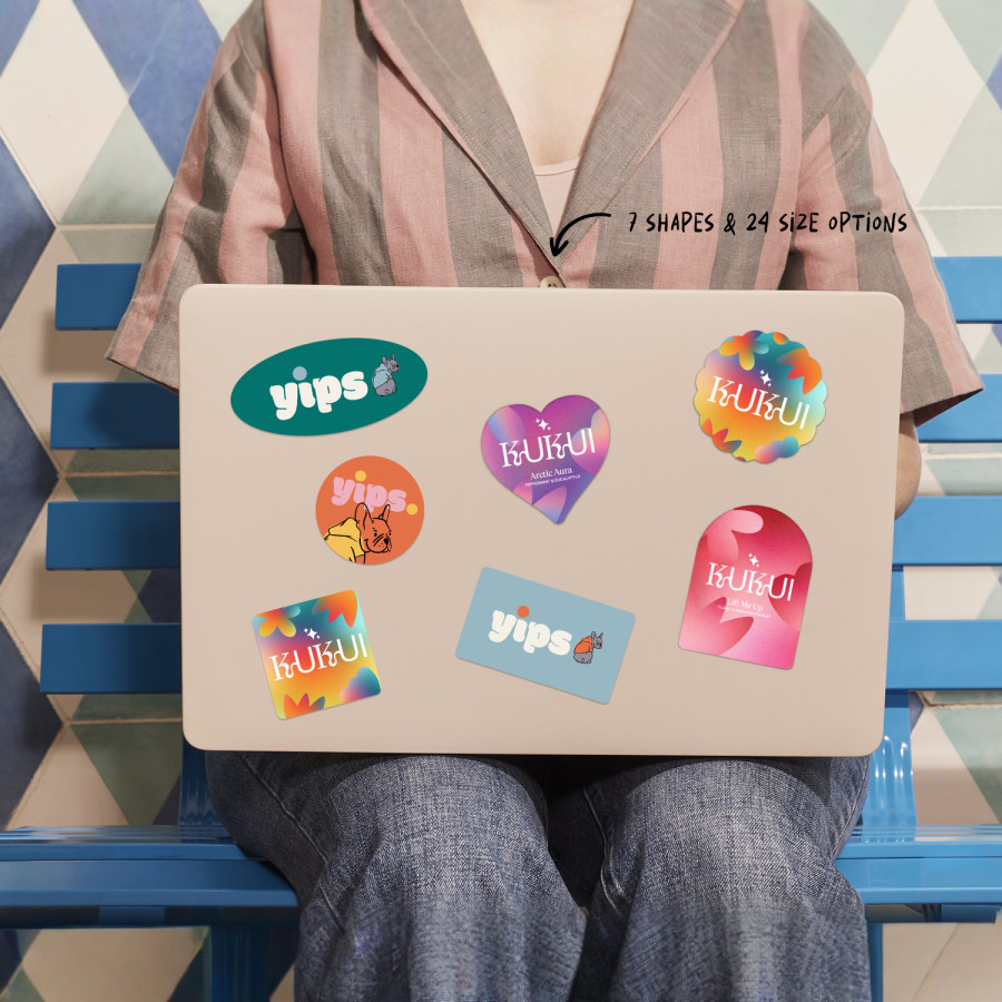 Stickers in different shapes, promoting small businesses on a laptop cover.  Boyrun: 7 Shapes & 24 Size Options