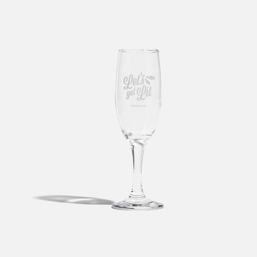 A champagne flute with someone's name and "Let's get lit".
