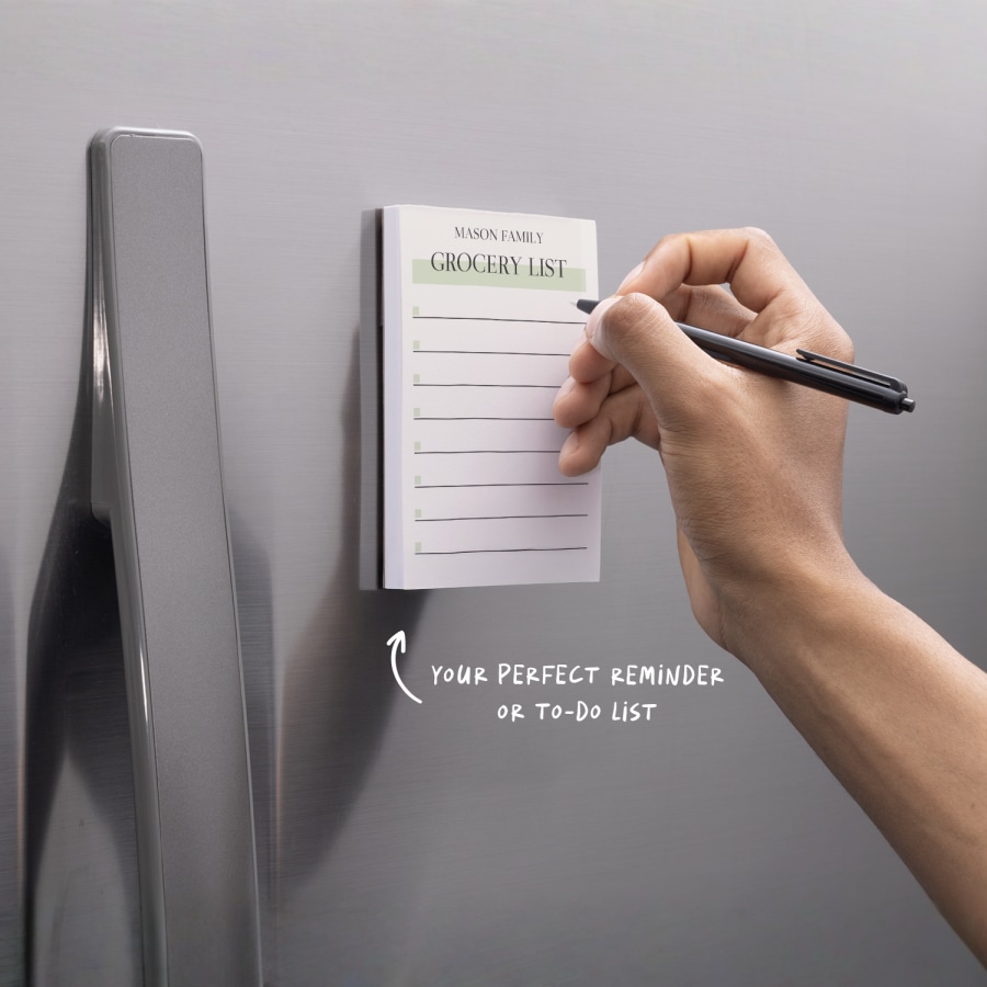 A personalised notepad featuring a family's grocery list.