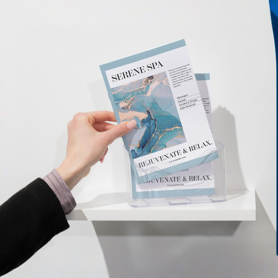A4 booklets promoting a spa, placed in a flyer box.