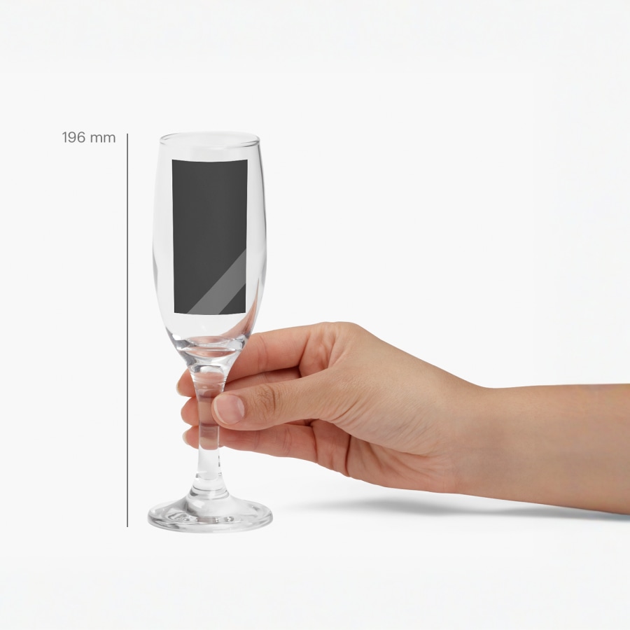 A champagne flute with a line showing its height; 196mm