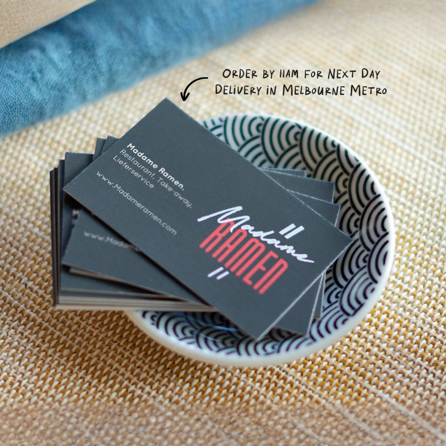 A stack of business cards with a reminder which reads: “Order by 11AM for next day delivery within Melbourne Metro.”