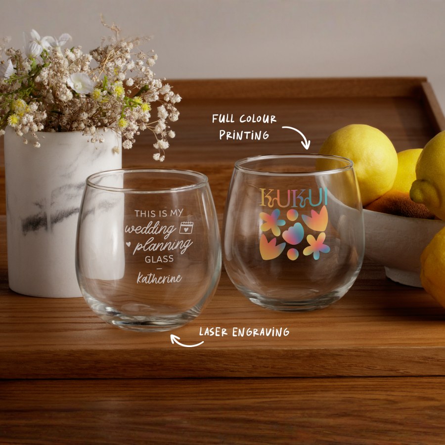 Two glasses, one with a design showing laser engraving and the other showing full-colour printing.
