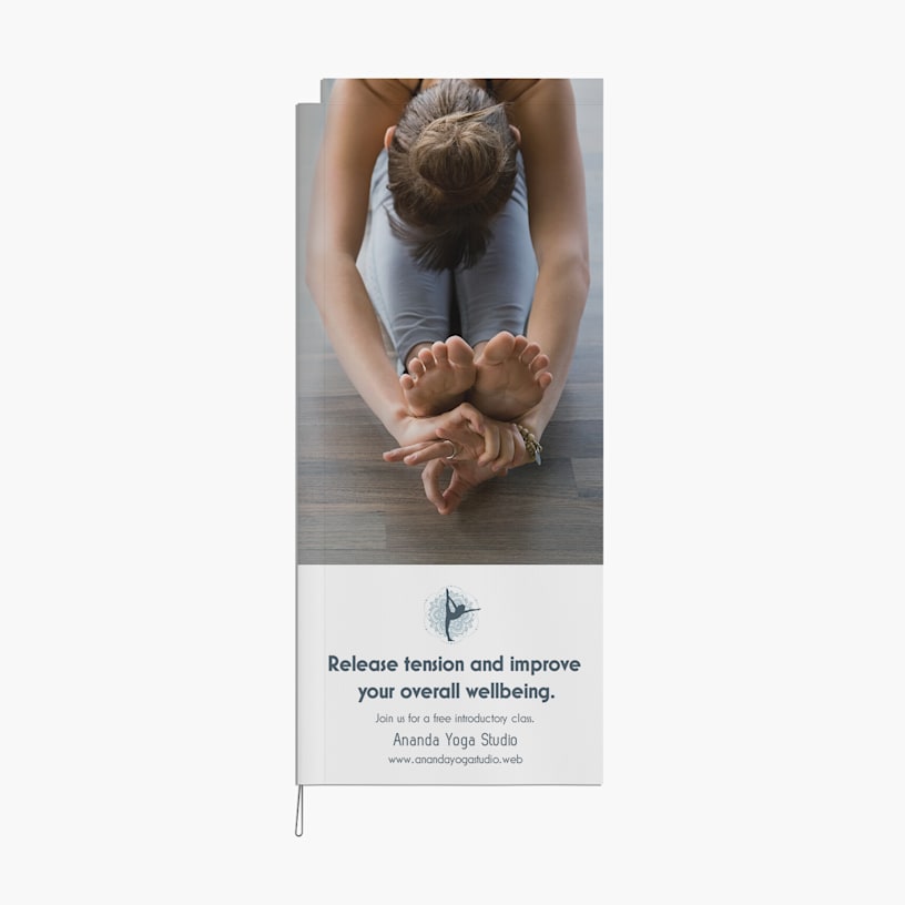 A white yoga rectangle flag with an image of a woman in a yoga pose.